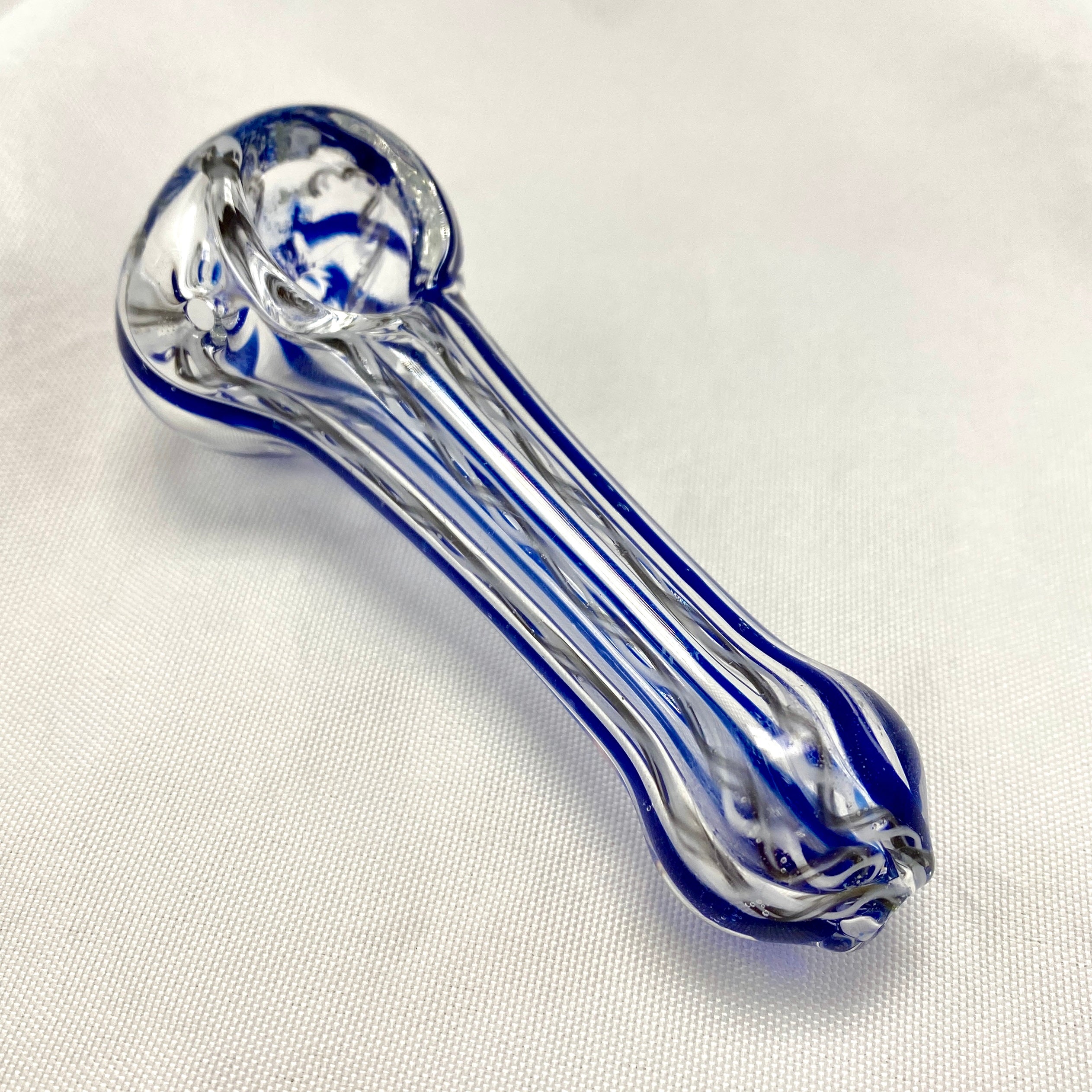 Clear glass pipe with blue accents on a white background