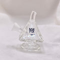 Clear glass water pipe with a logo on a white background